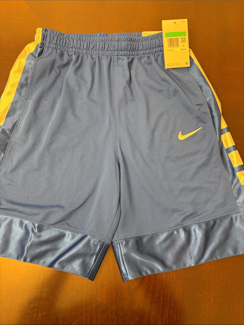 Nike Blue Athletic Shorts with whiteSwoosh Accent